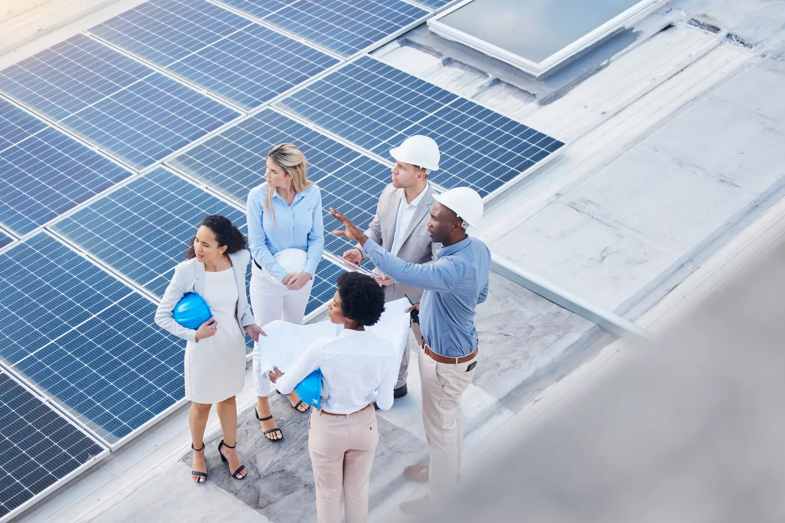 Commercial Solar Engineering and Project Planning | P&P Solar Solutions Commercial solar engineering team planning a rooftop photovoltaic installation